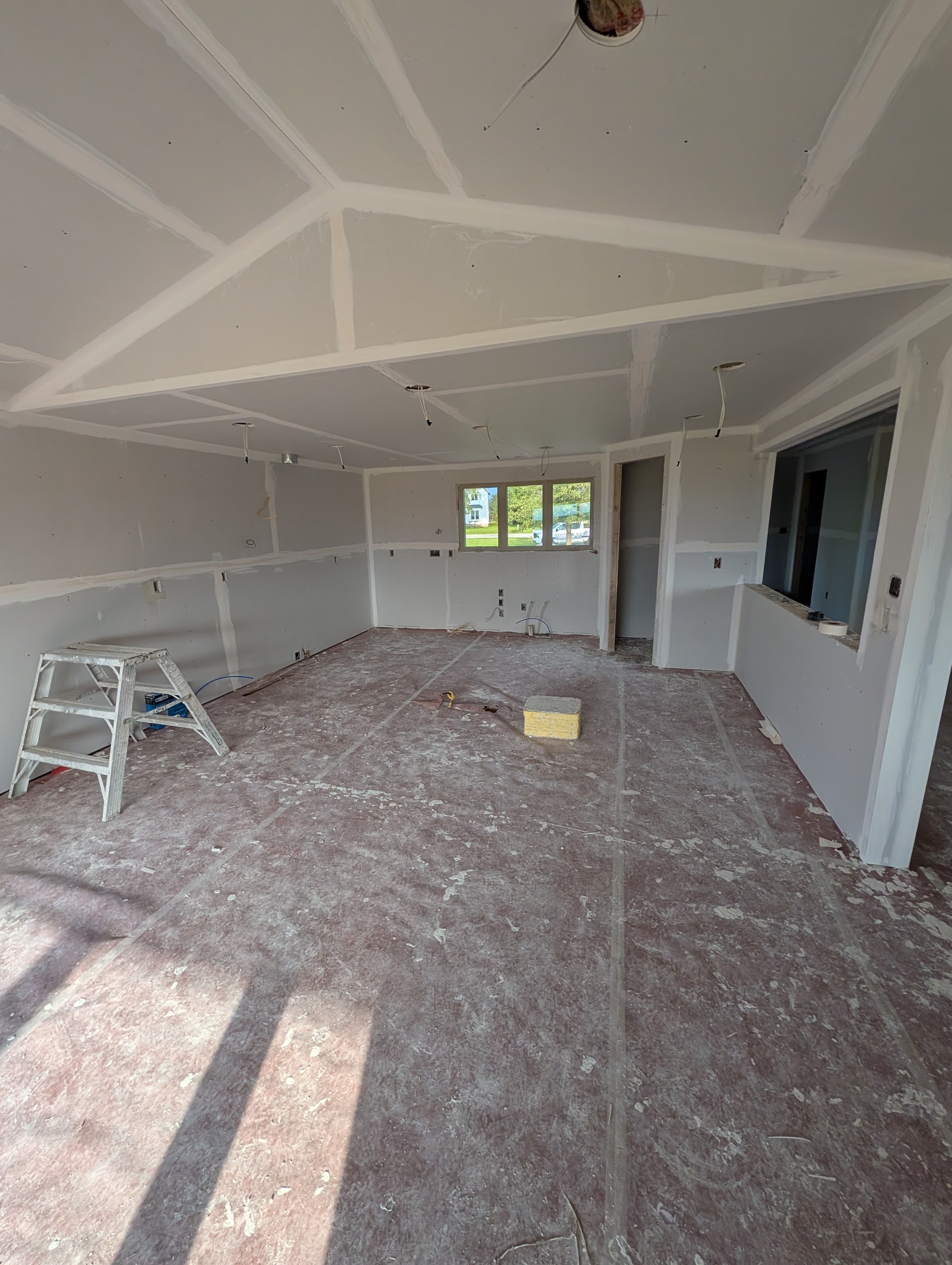 Construction demolition debris and dust in a Cedar Valley Iowa home during a remodel