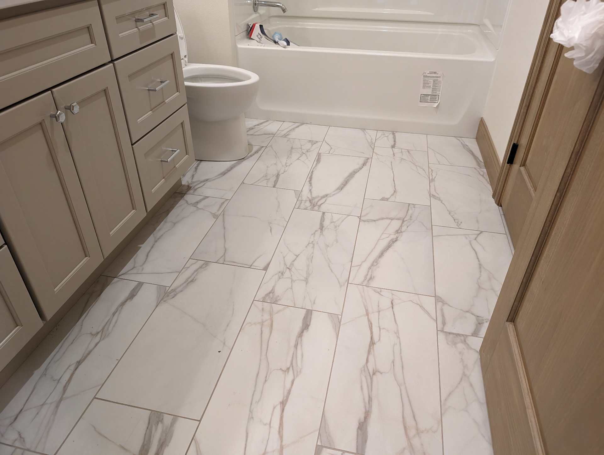 Marble Tile Bathroom Floor - Bathroom project in Cedar Valley, IA