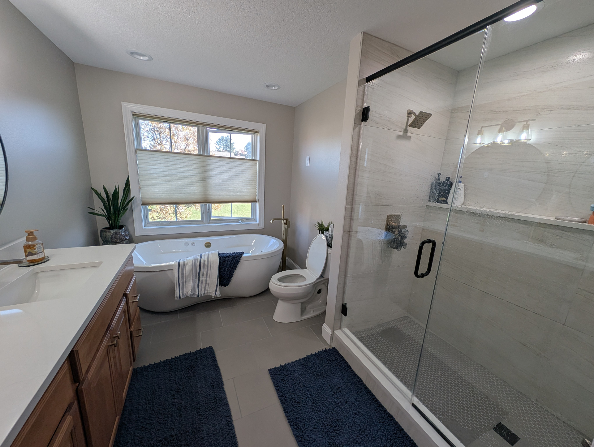 Finished spa bathroom remodel with a freestanding tub in Cedar Falls Iowa