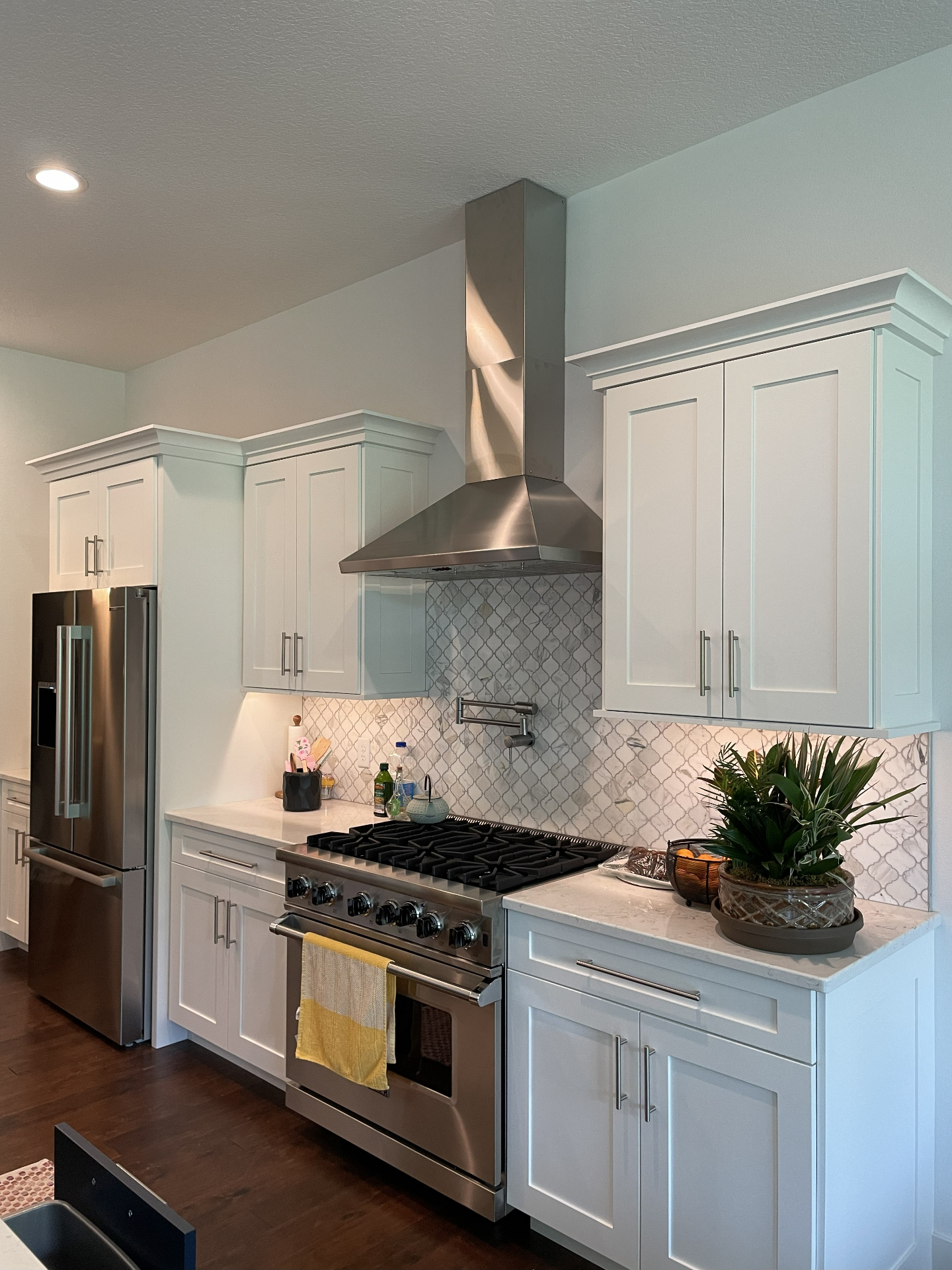 White Kitchen with Arabesque Tile - Kitchen project in Cedar Valley, IA